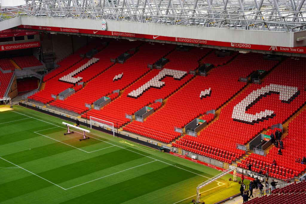 View of Anfield Stadium seating with prominent LFC letters. Perfect capture of iconic Liverpool FC venue.